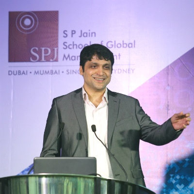 Mr. Purshottam Purswani, Chief Technologist, Head of Digital at ATOS India, delivers an engaging presentation on resolving digital dilemmas