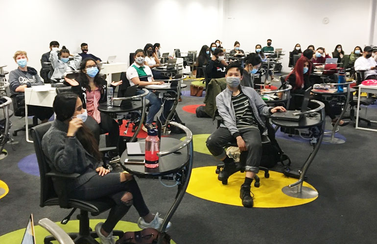 The Simulation room has been set up with socially distanced desks and seating