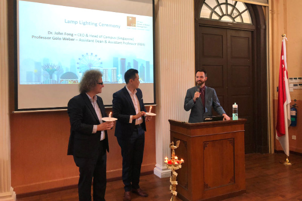 (Left to Right) Professor Golo Weber, Assistant Dean & Assistant Professor (BBA), Dr. John Fong, CEO & Head of Campus (Singapore) and Mr. Jim Faherty, Student Experience Manager, began the event with the lamp-lighting ceremony